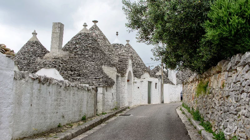 Street with trulli house in Alberobello