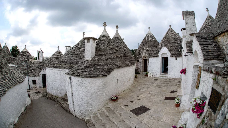 Courtyard of a trulli house in Alberobello Courtyard of a trulli house in Alberobello