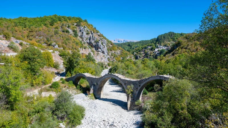 Plakidas bridge with mountains