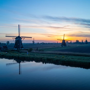 Windmills in Holland at sunrise