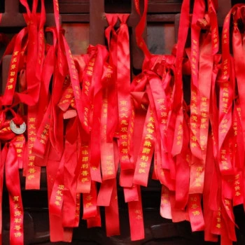 Wish ribbons on a temple door in China